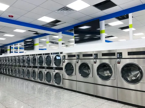 Row of industrial washing machines